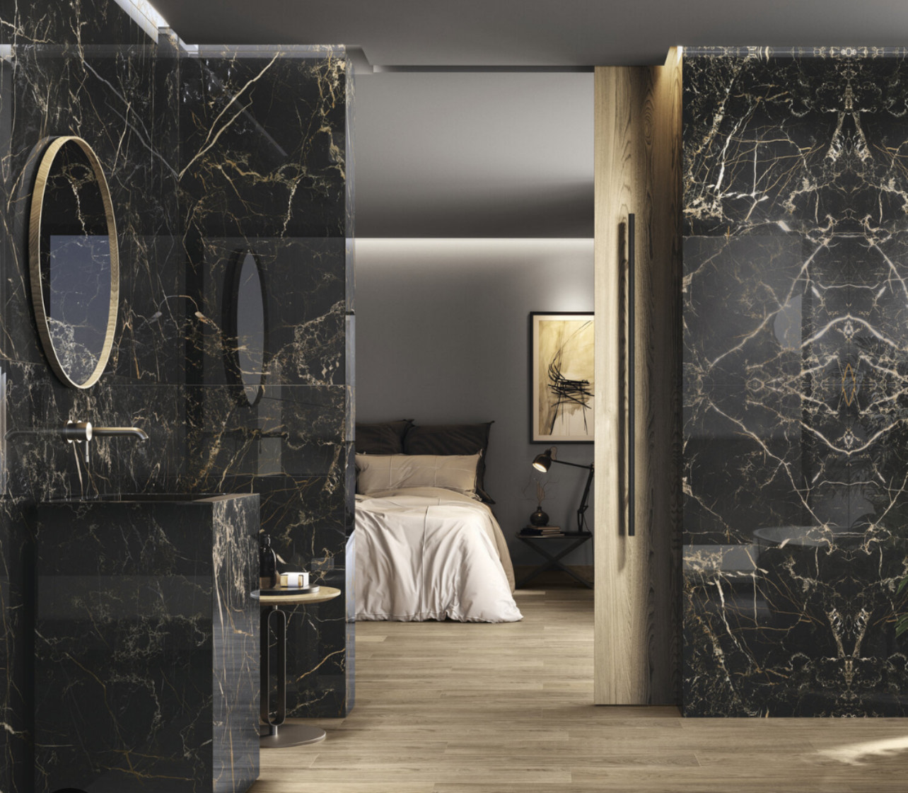 Large format black marble tile bathroom — floor-to-ceiling mitered tile installation with bookmatched panels, gold fixtures, and integrated vanity — premium tile work by Orleans Bath and Tile